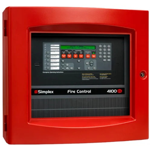 Technician working on a fire alarm control panel